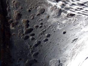 Corrosion damage on the yacht's exhaust pipe after blasting